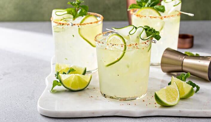 Three lemonades in clear glasses