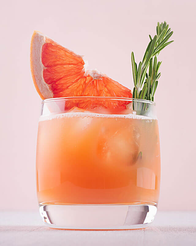 Cocktail in glass with fruit